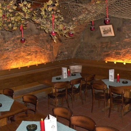 Seating areas in the cosy vaulted cellar