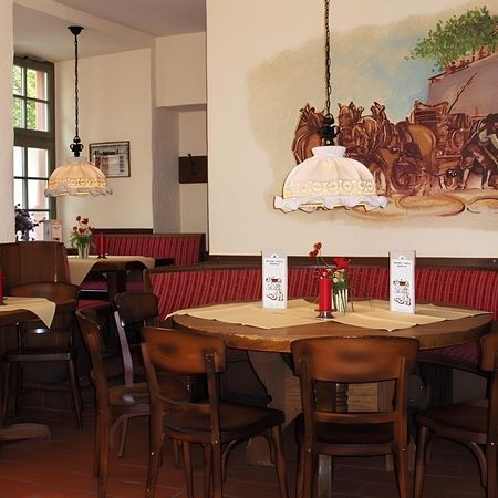 Brewery parlour with murals and tables that create an inviting atmosphere