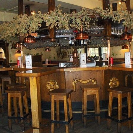 The bar in the Braustube with numerous stools